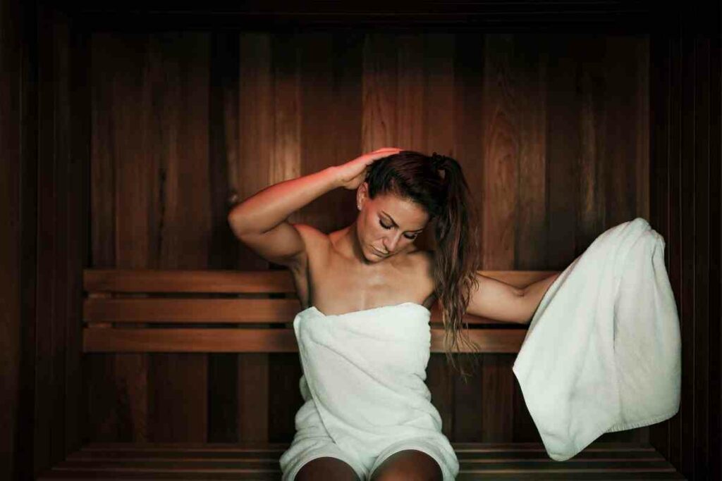 Enjoying sauna woman