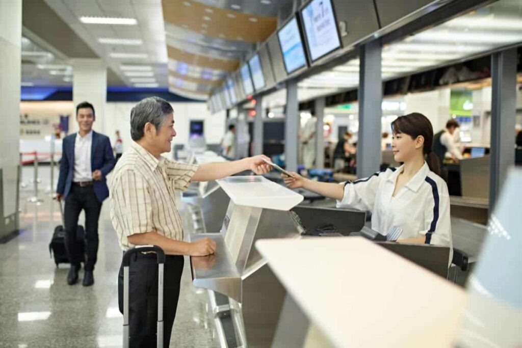 Passengers and checking-in at the counter.