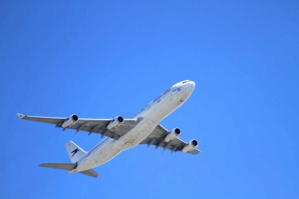 Aircraft taking off in clear blue skies